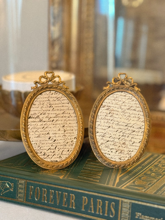 Antique Gilt Oval Easel Frames with Ribbon Crest
